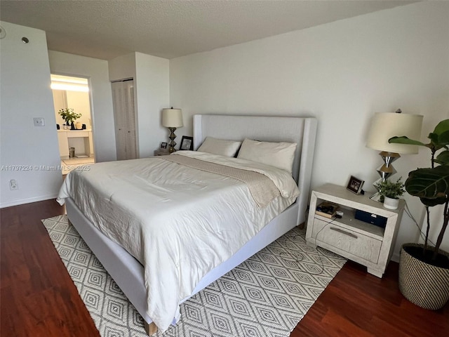 3300 NE 192nd St Unit 803, Aventura, FL 33180 - bedroom featuring wood finished floors, a closet, and baseboards