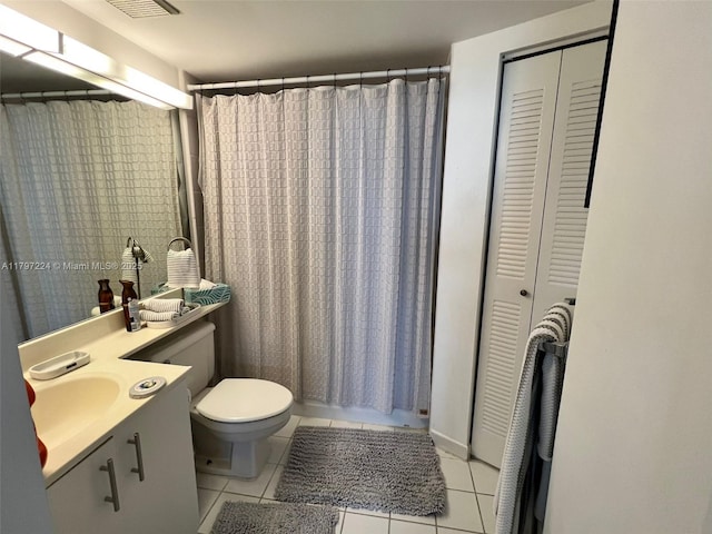 3300 NE 192nd St Unit 803, Aventura, FL 33180 - bathroom featuring tile patterned flooring, vanity, toilet, and a shower with curtain