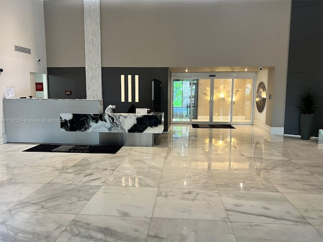 3300 NE 192nd St Unit 803, Aventura, FL 33180 - community lobby featuring a high ceiling
