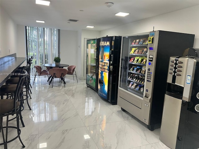 3300 NE 192nd St Unit 803, Aventura, FL 33180 - interior space featuring light marble finish flooring and floor to ceiling windows