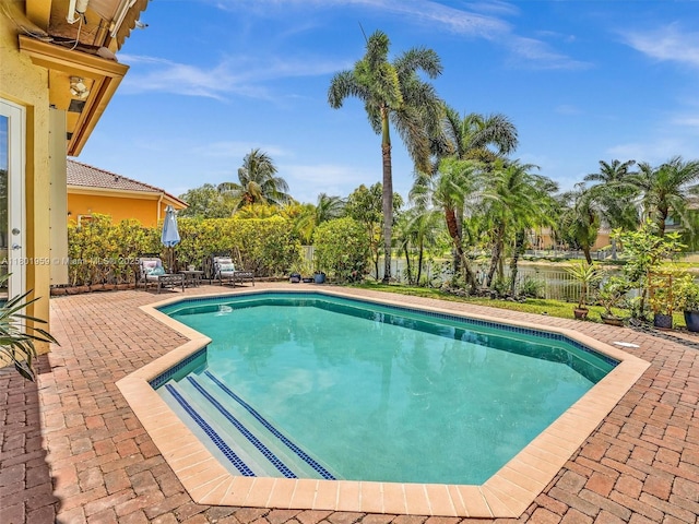 3230 SW 194th Ter, Miramar, FL 33029 - view of swimming pool featuring a patio and a fenced backyard