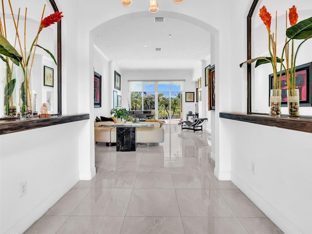 3230 SW 194th Ter, Miramar, FL 33029 - corridor with arched walkways, baseboards, and crown molding