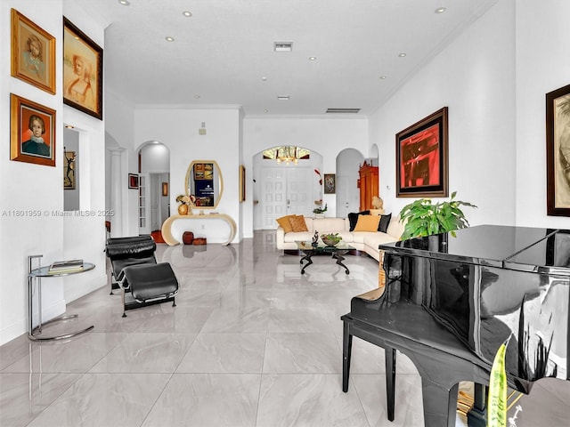 3230 SW 194th Ter, Miramar, FL 33029 - sitting room with arched walkways, marble finish flooring, a chandelier, recessed lighting, and crown molding