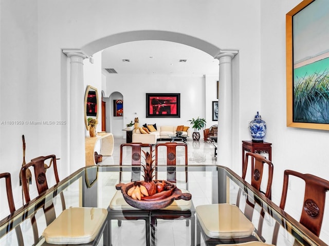 3230 SW 194th Ter, Miramar, FL 33029 - dining room featuring arched walkways, ornate columns, and tile patterned flooring