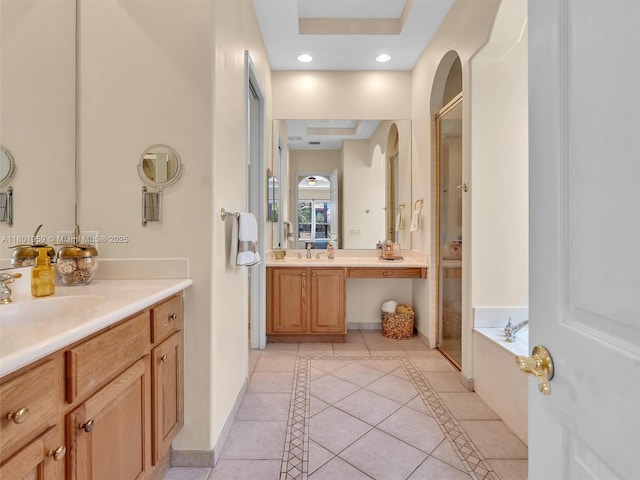 3230 SW 194th Ter, Miramar, FL 33029 - bathroom featuring tile patterned floors, a shower stall, a garden tub, two vanities, and baseboards