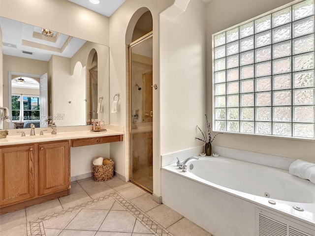 3230 SW 194th Ter, Miramar, FL 33029 - bathroom with plenty of natural light, a stall shower, a garden tub, and vanity