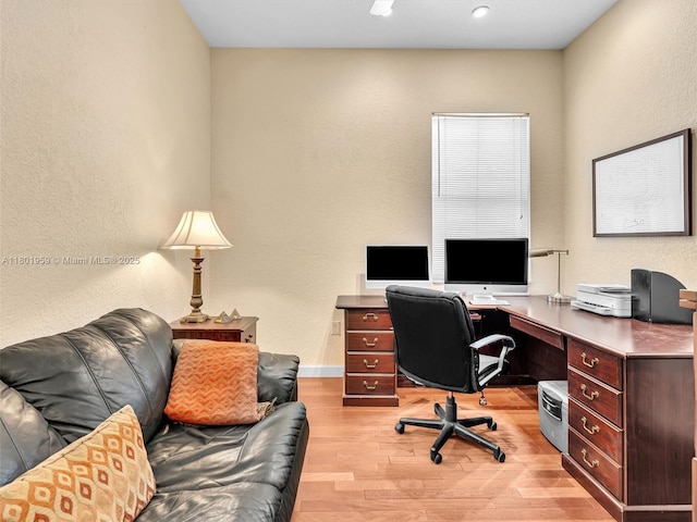 3230 SW 194th Ter, Miramar, FL 33029 - office space with a textured wall, light wood finished floors, and baseboards