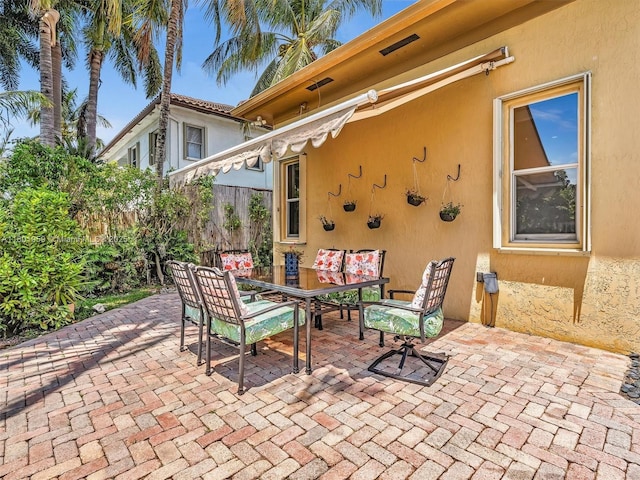 3230 SW 194th Ter, Miramar, FL 33029 - view of patio featuring outdoor dining area and fence