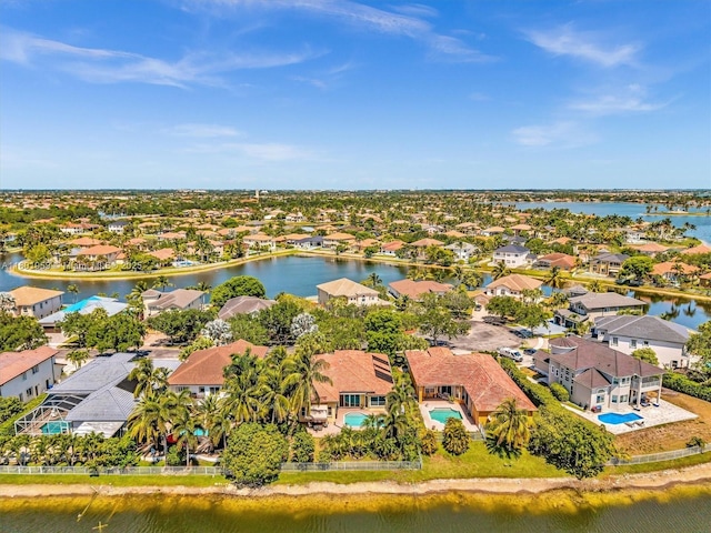3230 SW 194th Ter, Miramar, FL 33029 - aerial perspective of suburban area with a nearby body of water and a pool area