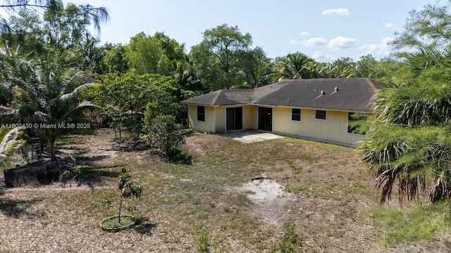 17254 N 32nd Ln N, Loxahatchee, FL 33470 - back of property with a patio