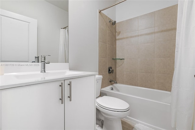 bathroom featuring toilet, shower / bath combination with curtain, and vanity