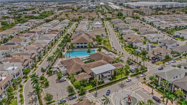 aerial view of property's location with a pool