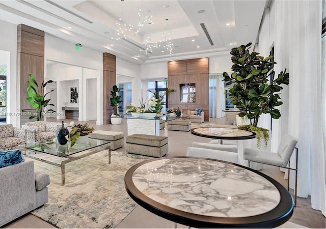 building lobby featuring recessed lighting and a towering ceiling