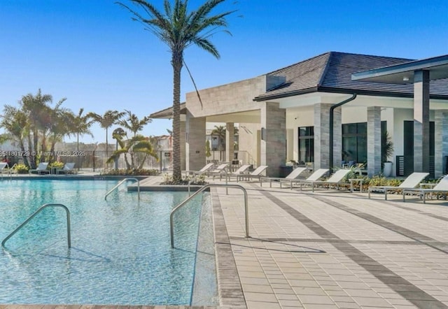 community pool featuring a patio