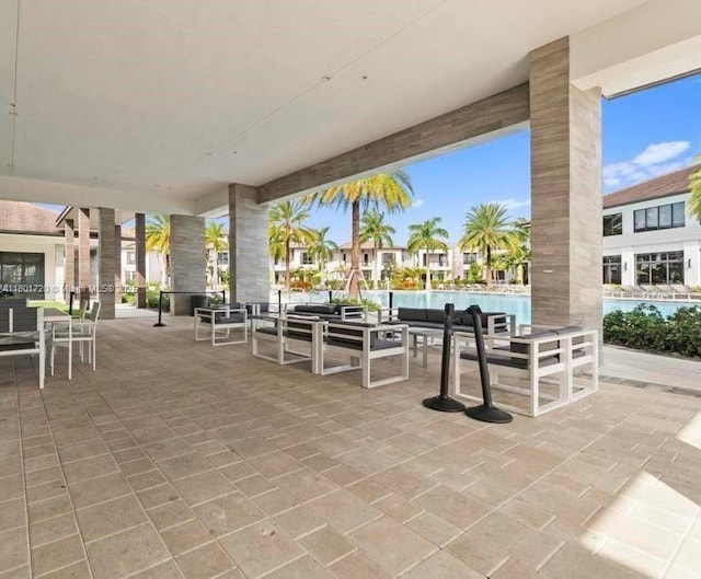 view of patio featuring a swimming pool and an outdoor hangout area