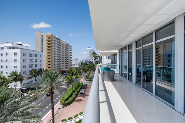 balcony featuring a view of city