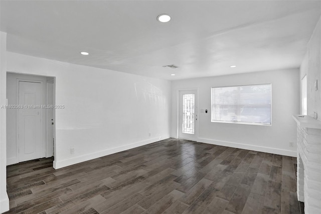 242 SW 9th St, Dania Beach, FL 33004 - empty room featuring dark wood finished floors, recessed lighting, and baseboards