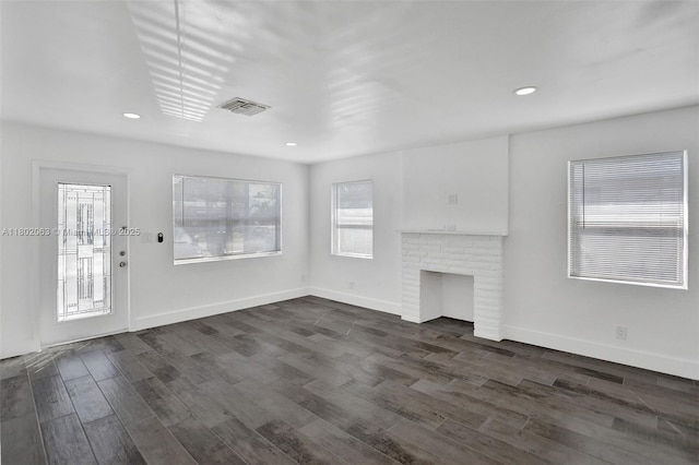 242 SW 9th St, Dania Beach, FL 33004 - unfurnished living room featuring dark wood finished floors, recessed lighting, and baseboards