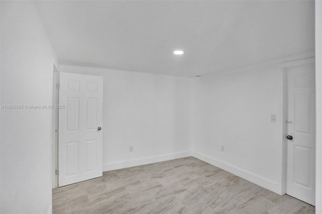 242 SW 9th St, Dania Beach, FL 33004 - empty room with baseboards and recessed lighting