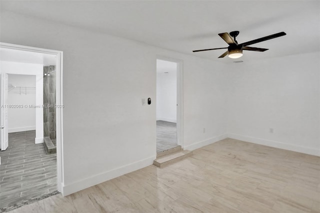 242 SW 9th St, Dania Beach, FL 33004 - spare room with a ceiling fan, baseboards, and wood finished floors