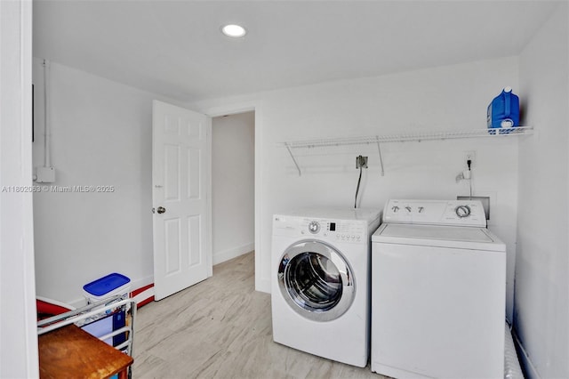 242 SW 9th St, Dania Beach, FL 33004 - washroom featuring washer and clothes dryer, recessed lighting, and baseboards