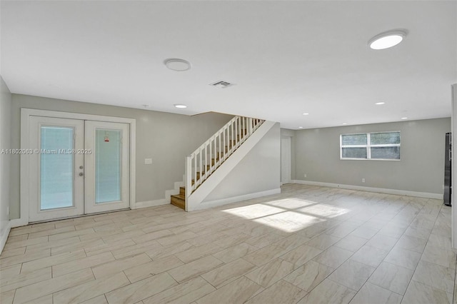 242 SW 9th St, Dania Beach, FL 33004 - below grade area featuring stairway, french doors, baseboards, and recessed lighting