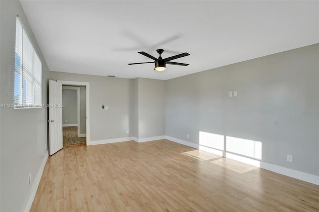 242 SW 9th St, Dania Beach, FL 33004 - empty room with light wood finished floors, baseboards, and a ceiling fan