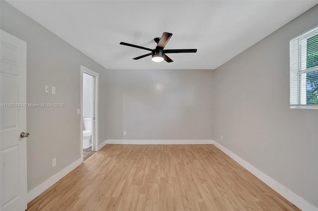 242 SW 9th St, Dania Beach, FL 33004 - empty room with light wood finished floors, ceiling fan, and baseboards