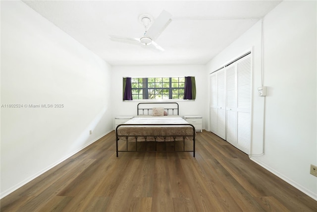 605 Oaks Dr Unit 203, Pompano Beach, FL 33069 - bedroom with wood finished floors, a closet, ceiling fan, and baseboards