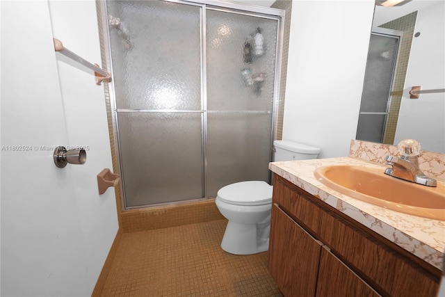 605 Oaks Dr Unit 203, Pompano Beach, FL 33069 - bathroom featuring toilet, a shower stall, and vanity