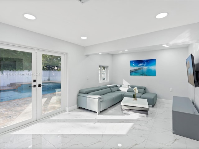 6820 SW 9th St, Pembroke Pines, FL 33023 - living room with baseboards, light marble finish floors, recessed lighting, and french doors