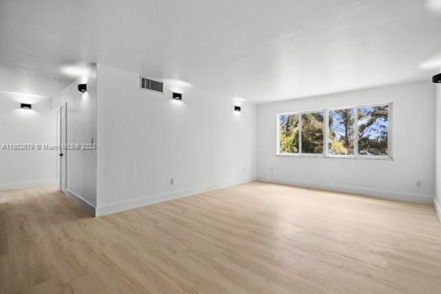 14840 Naranja Lakes Blvd Unit C4B, Homestead, FL 33032 - spare room with wood finished floors and baseboards