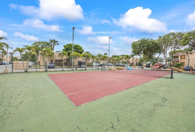 241 W Park Dr Unit 5-103, Miami, FL 33172 - view of tennis court featuring fence and a residential view