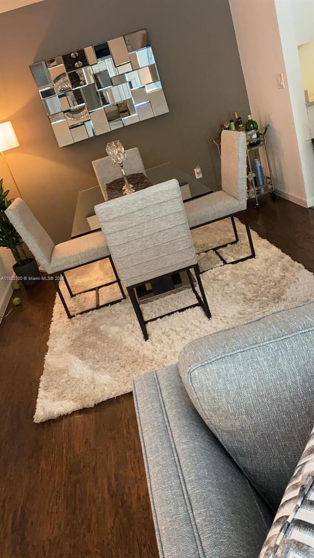 1610 NW 128th Dr Unit 104, Sunrise, FL 33323 - living area with baseboards and wood finished floors