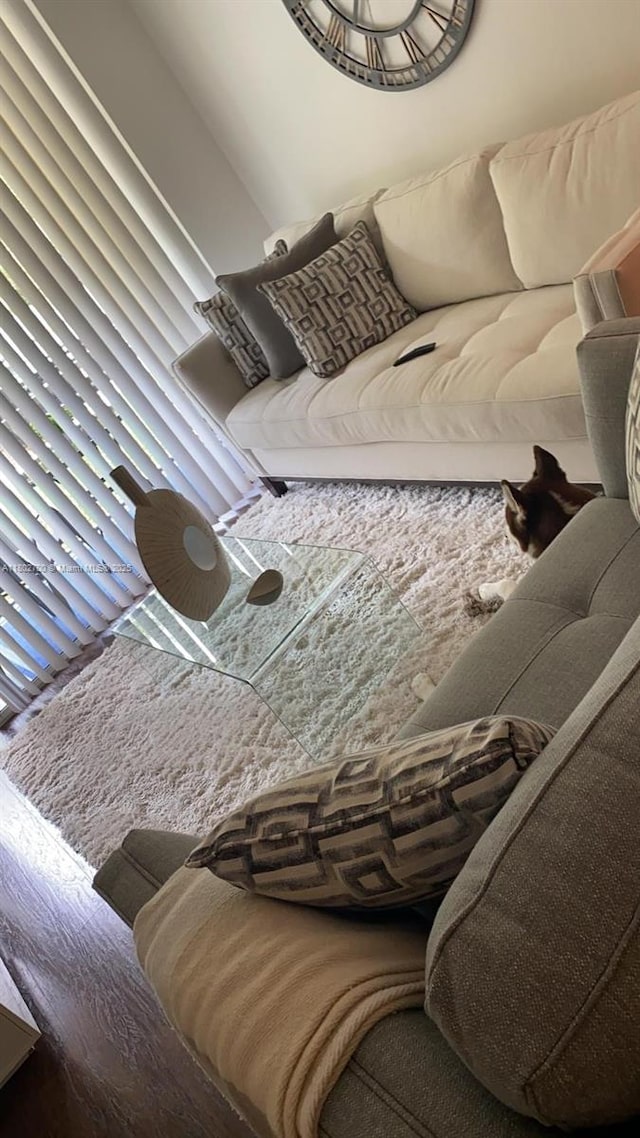 1610 NW 128th Dr Unit 104, Sunrise, FL 33323 - living area featuring wood finished floors
