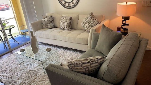 1610 NW 128th Dr Unit 104, Sunrise, FL 33323 - living area featuring wood finished floors
