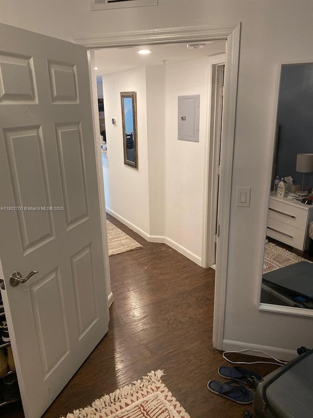 1610 NW 128th Dr Unit 104, Sunrise, FL 33323 - corridor with electric panel, baseboards, and dark wood-style floors