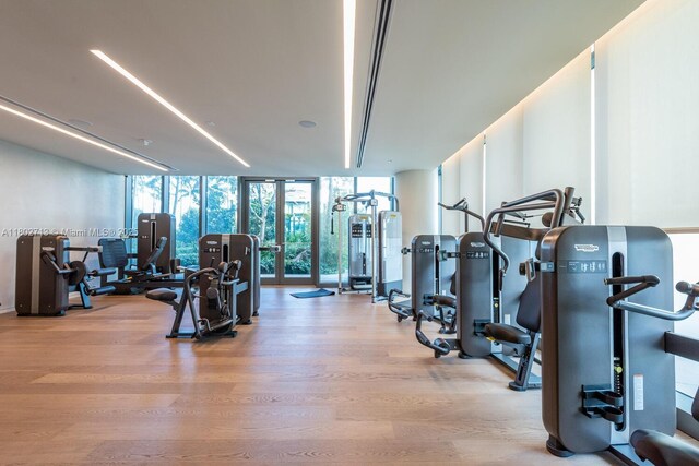 650 NE 32nd St Unit 4405, Miami, FL 33137 - gym featuring expansive windows and wood finished floors