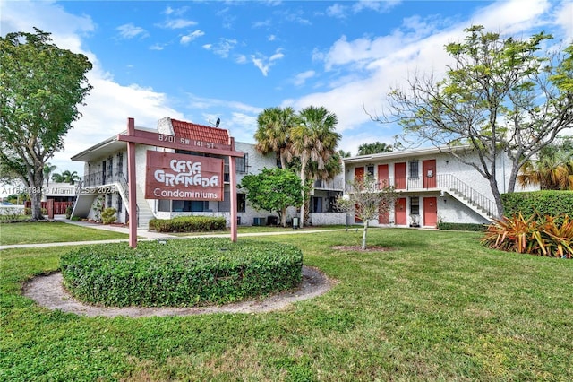 view of property featuring stairway