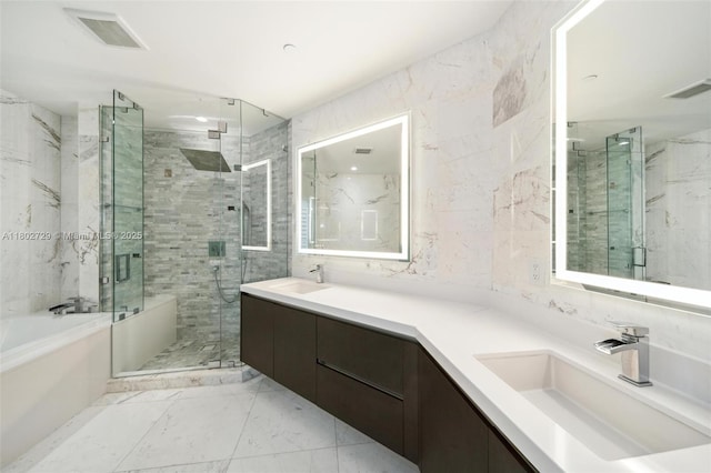 851 NE 1st Ave Unit 3107, Miami, FL 33132 - full bathroom with double vanity, a garden tub, marble finish floors, a marble finish shower, and tile walls