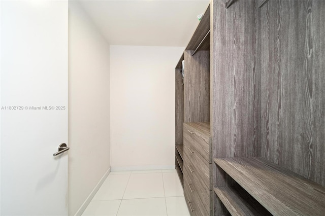 851 NE 1st Ave Unit 3107, Miami, FL 33132 - walk in closet featuring tile patterned floors