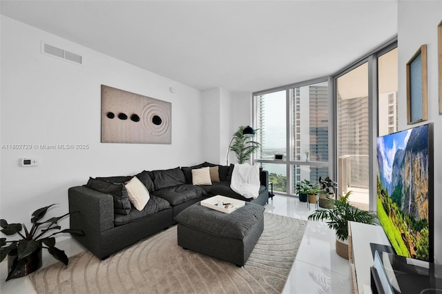 851 NE 1st Ave Unit 3107, Miami, FL 33132 - tiled living room featuring a wall of windows