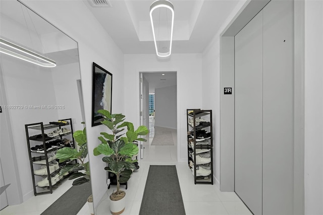 851 NE 1st Ave Unit 3107, Miami, FL 33132 - corridor with elevator and light tile patterned floors