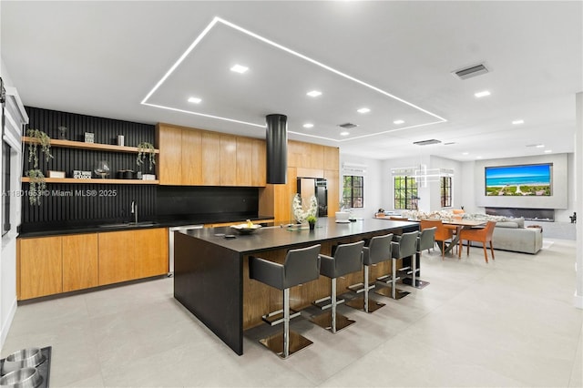 1504 Passion Vine Cir Unit 23-4, Weston, FL 33326 - bar area featuring a sink, refrigerator, and recessed lighting