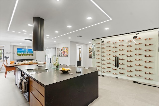 1504 Passion Vine Cir Unit 23-4, Weston, FL 33326 - kitchen with black electric cooktop, a large island, modern cabinets, wall oven, and recessed lighting