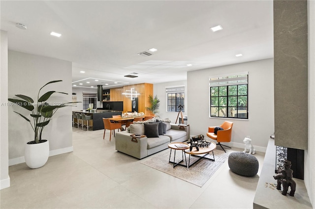 1504 Passion Vine Cir Unit 23-4, Weston, FL 33326 - living room featuring baseboards and recessed lighting