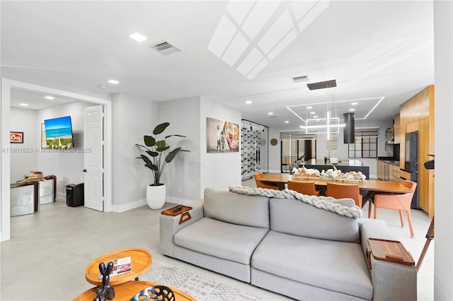 1504 Passion Vine Cir Unit 23-4, Weston, FL 33326 - living room with recessed lighting, baseboards, and a chandelier
