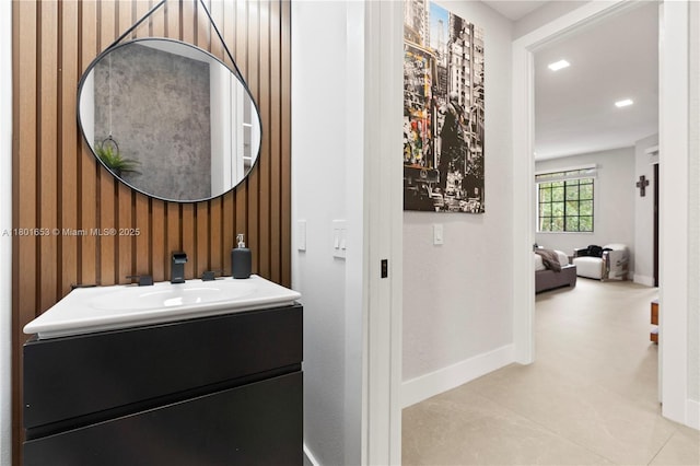 1504 Passion Vine Cir Unit 23-4, Weston, FL 33326 - bathroom featuring vanity, baseboards, recessed lighting, and wooden walls