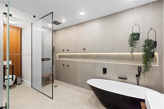 1504 Passion Vine Cir Unit 23-4, Weston, FL 33326 - bathroom featuring a walk in shower, a soaking tub, recessed lighting, and tile patterned flooring