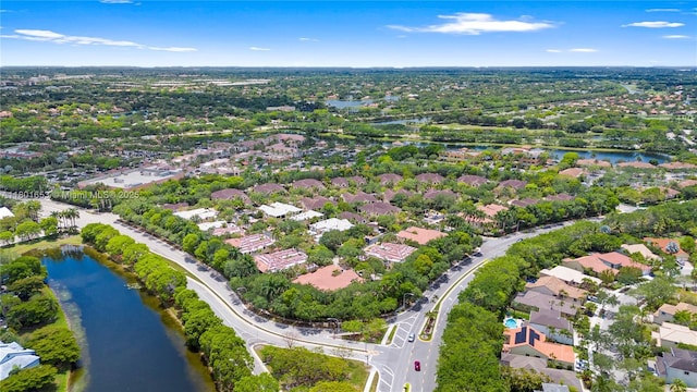 1504 Passion Vine Cir Unit 23-4, Weston, FL 33326 - aerial view of property's location with a large body of water and nearby suburban area